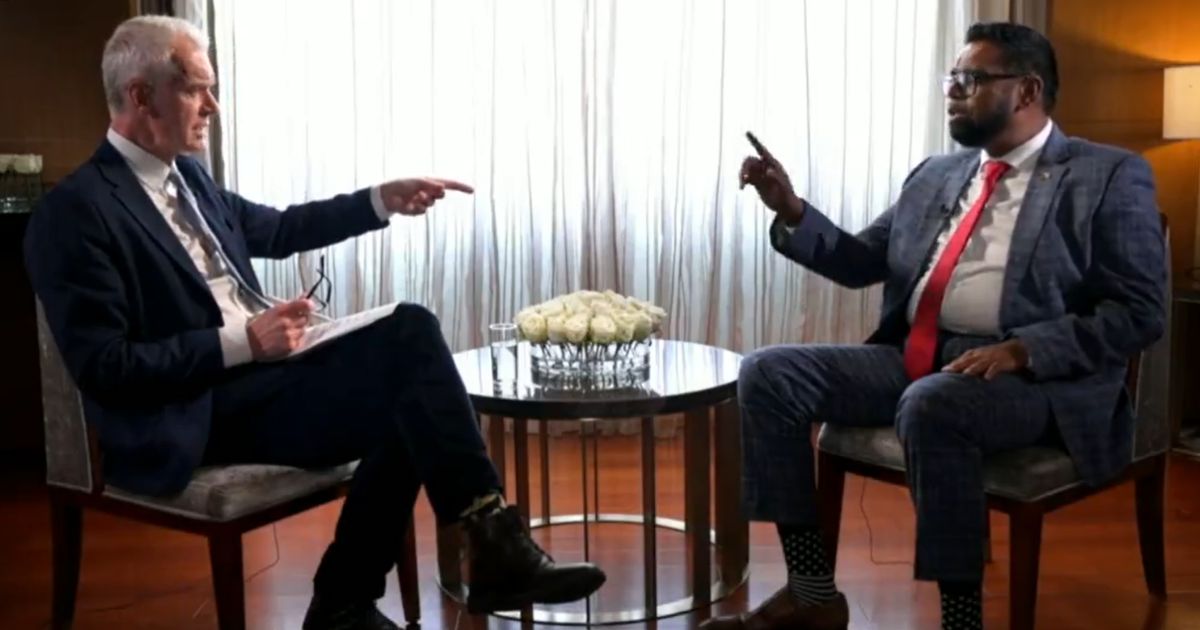 Stephen Sackur, left, host of the BBC's "HARDtalk," and Guyuna President Mohamed Irfaan Ali, right, argue about the South American country's oil reserves.