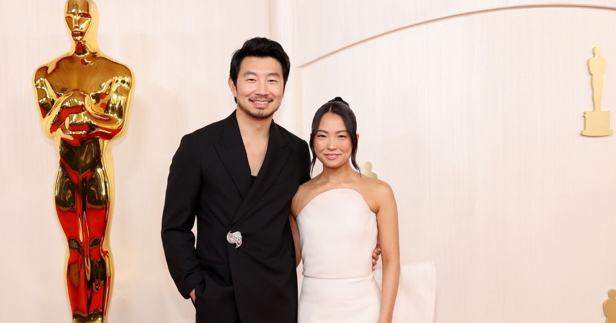 Simu Liu and Allison Hsu attending the 96th Academy Awards in Hollywood, California, on March 10, 2024.