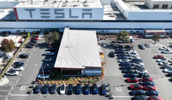 New Tesla cars sit in a parking lot at the Tesla factory in Fremont, California, on Oct. 19, 2022.
