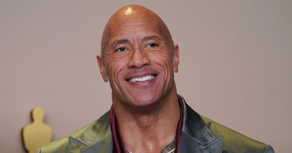 Dwayne "The Rock" Johnson poses in the press room at the Oscars on March 10 in Los Angeles.