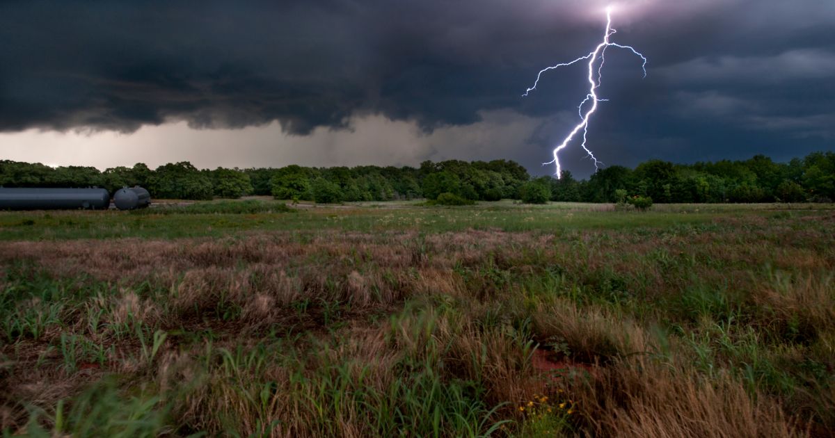 Lightning bolts land near Interstate 35 near Wellington, Kansas, during a spring thunderstorm.