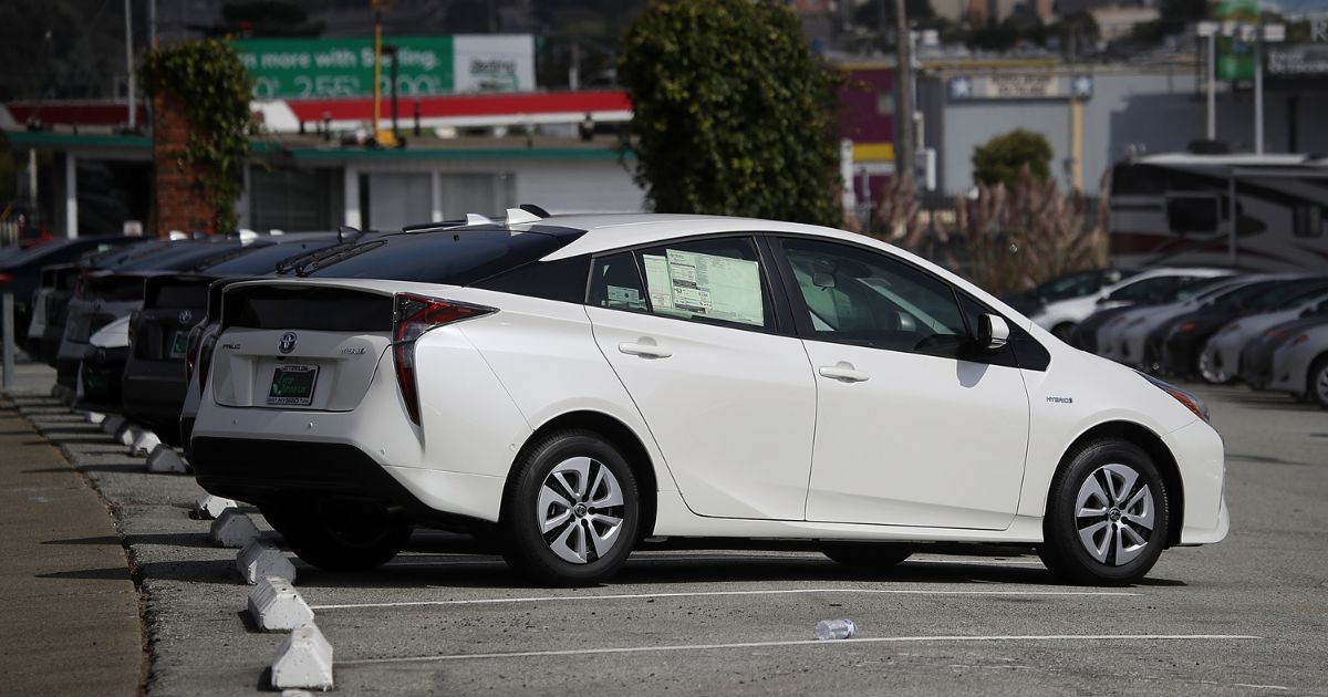 Brand new Toyota Prius cars are displayed on a sales lot at City Toyota in Daly City, California, on Sept. 5, 2018.