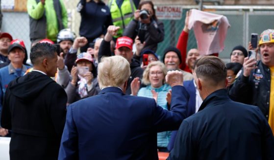 Former President Donald Trump greets union workers at the construction site of the new J.P. Morgan Chase building in New York on Wednesday.