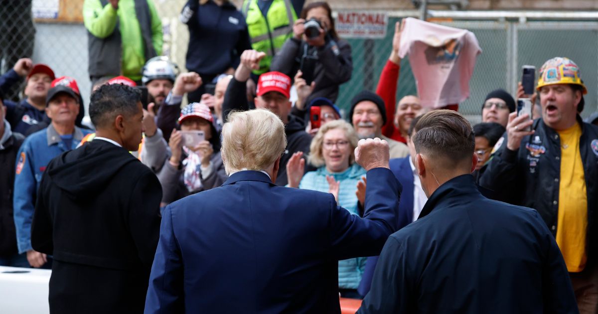 Former President Donald Trump greets union workers at the construction site of the new J.P. Morgan Chase building in New York on Wednesday.