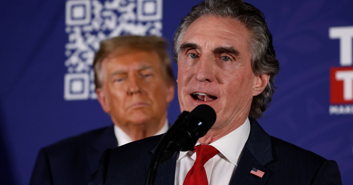 North Dakota Governor Doug Burgum encourages voters to support Republican presidential candidate and former President Donald Trump during a campaign rally in the basement ballroom of The Margate Resort on Jan. 22, 2024, in Laconia, New Hampshire. Burgum ran against Trump for the Republican presidential nomination but later dropped out and endorsed him.