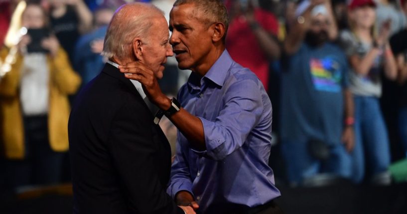 President Joe Biden and former President Barack Obama embrace on stage during a rally for Pennsylvania Democrats on Nov. 5, 2022, in Philadelphia.