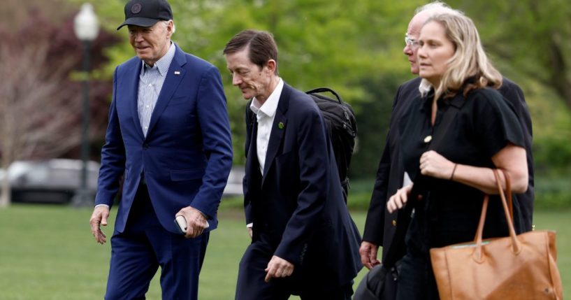 President Joe Biden walks to the White House with senior members of his staff after landing on the South Lawn in Marine One on April 17. Biden spent the night in the Pittsburgh area, delivering remarks at the United Steelworkers headquarters.
