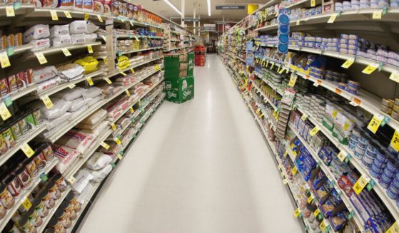 An aisle of a grocery store is shown in this stock photo. Meanwhile, supermarket chain Harris Teeter is implementing new security measures at its Washington, D.C., stores.