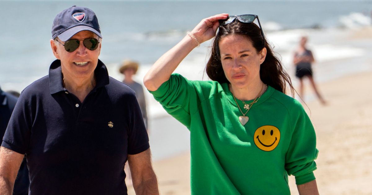 President Joe Biden walks on the beach with daughter Ashley Biden, in Rehoboth Beach, Delaware, June 20, 2022.
