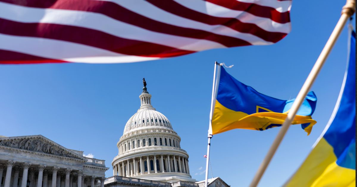 American and Ukrainian flags fly near the U.S. Capitol Saturday in Washington, D.C., after the House passed a $95 billion foreign aid package for Ukraine, Israel and Taiwan.