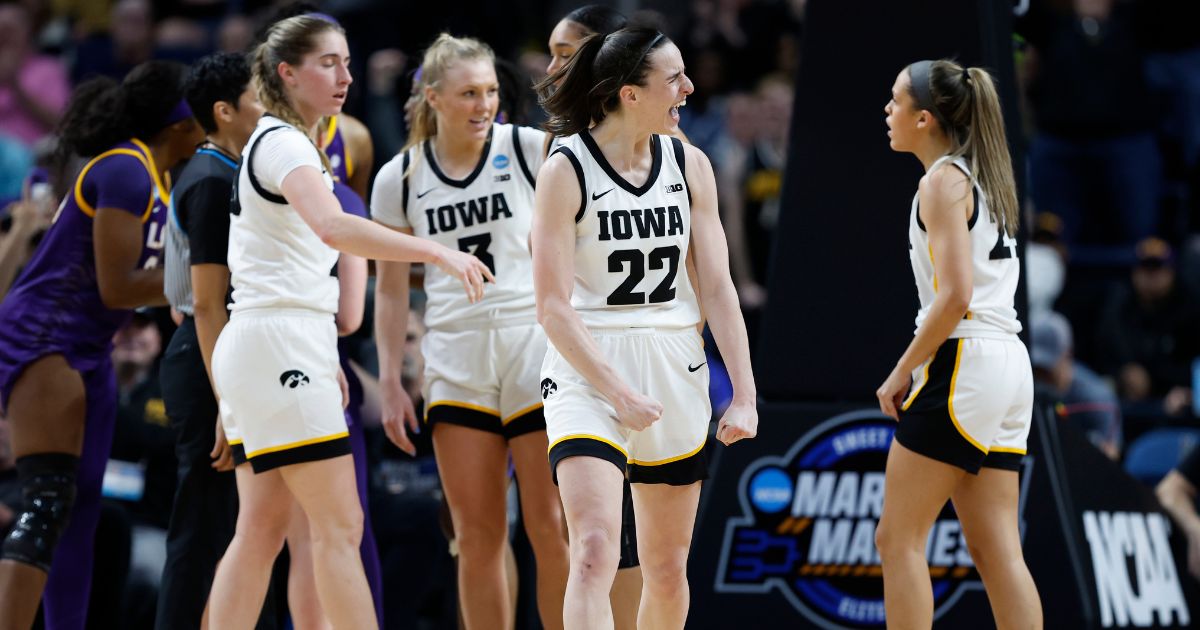 Iowa Hawkeyes Caitlin Clark, 22, celebrates during the second half against the LSU Tigers in the Elite 8 round of the NCAA Women's Basketball Tournament in Albany, New York, on Monday.