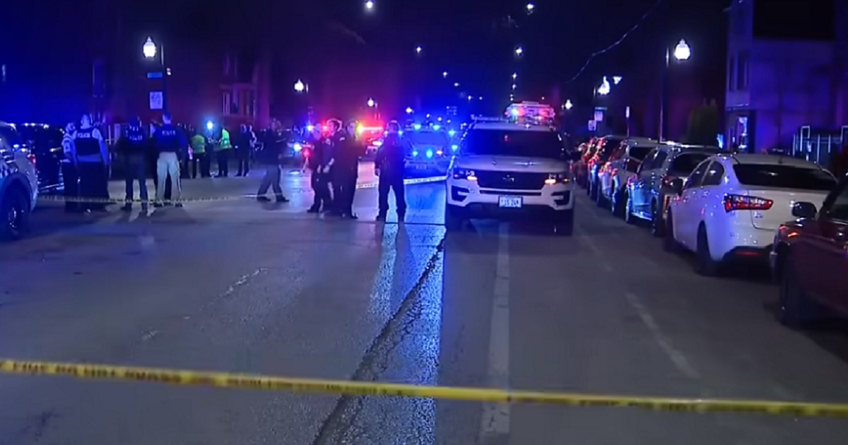 Police on the scene of a shooting in Chicago Saturday night that left an 8-year-old girl dead.