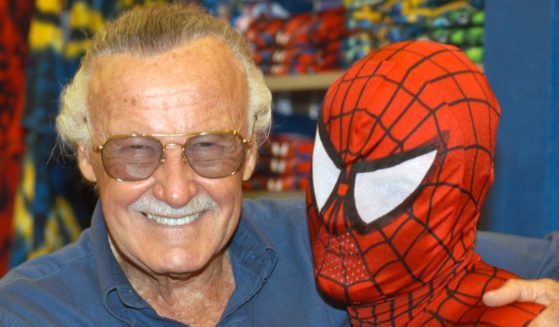 Creator Stan Lee (L) poses with Spider-Man during the Spider-Man 40th Birthday celebration at Universal Studios on August 13, 2002 in Universal City, California.