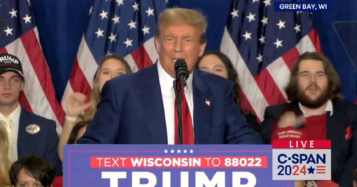 Former President Donald Trump addresses supporters Tuesday in Green Bay, Wisconsin.