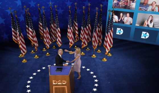 Then-Democratic presidential nominee Joe Biden is greeted by his wife, Jill Biden, after delivering his acceptance speech on the fourth night of the Democratic National Convention from the Chase Center in Wilmington, Delaware, on Aug. 20, 2020. The convention, which had been expected to draw 50,000 people to Milwaukee, took place virtually due to the coronavirus pandemic.