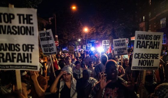 Pro-Palestinian demonstrators march back to George Washington University Tuesday in Washington, D.C. Pro-Palestinian encampments have sprung up at college campuses around the country with some demonstrators calling for schools to divest from Israeli interests amid the ongoing war in Gaza.