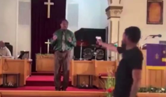 On Sunday, Pastor Glenn Germany, left, was giving a sermon at Jesus' Dwelling Place Church in North Braddock, Pennsylvania, when Bernard Polite, right, walked up with a gun attempting to shoot Germany.