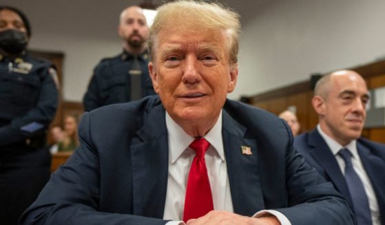 Former President Donald Trump sits in court during his trial at Manhattan Criminal Court in New York City on Tuesday.