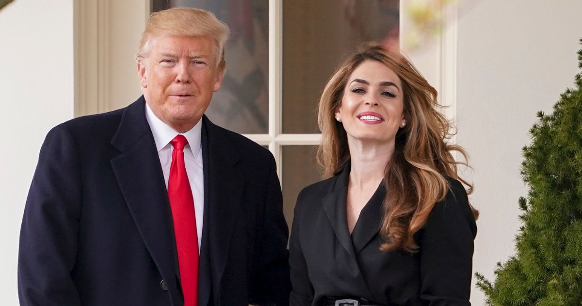 Donald Trump posing with Hope Hicks on her last day on the South Lawn of the White House