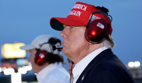 Donald Trump watches the NASCAR Coca-Cola 600 from the top of the press box
