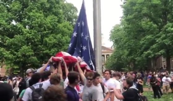 Fraternity men from University of North Carolina - Chapel Hill went viral for defending the American flag from protesters who sought to tear it down and replace it with a Palestinian one.