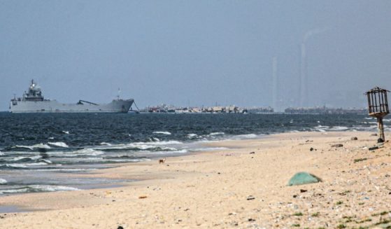A ship transporting international humanitarian aid is moored at the U.S.-built floating pier near Nuseirat in the Gaza Strip on Tuesday.