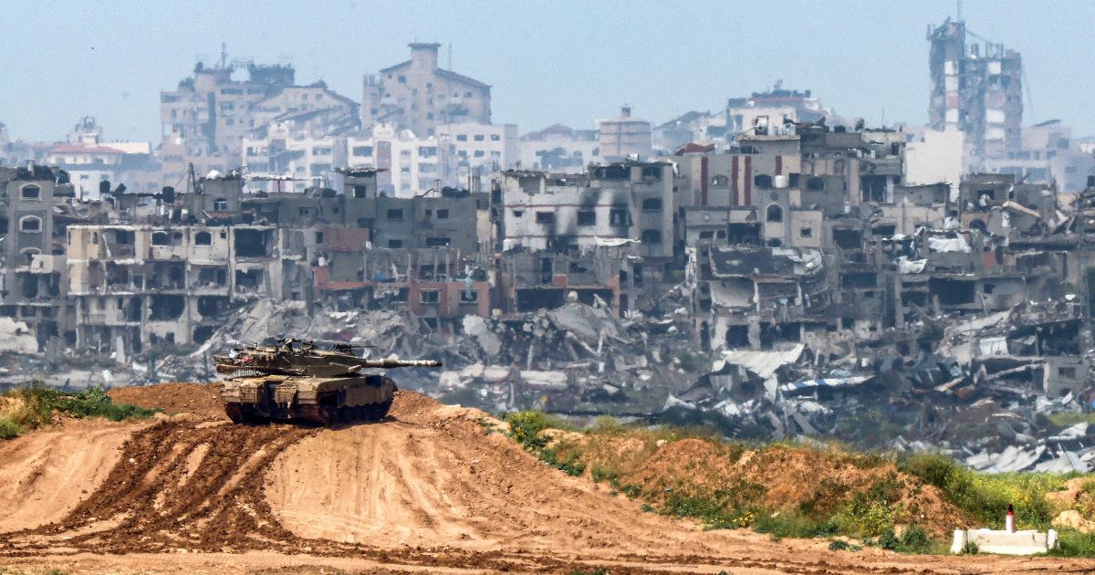 A photo taken from Israel's southern border with the Gaza Strip shows an Israeli tank at a position along the border with the Palestinian territory on March 19.