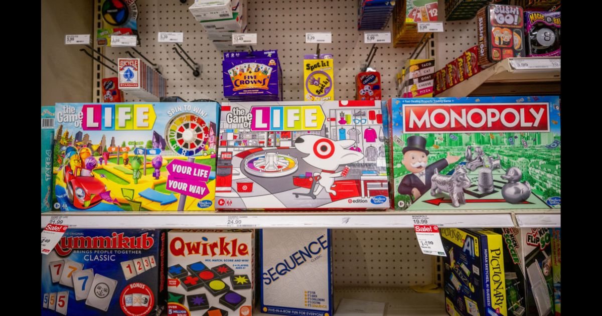 Hasbro board games sitting on a store shelf in a Target located in Austin, Texas.