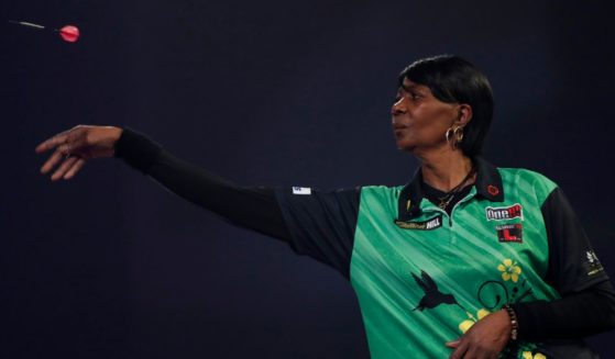 Deta Hedman competes in the PDC William Hill World Darts Championship at Alexandra Palace in London on Dec. 19, 2020.
