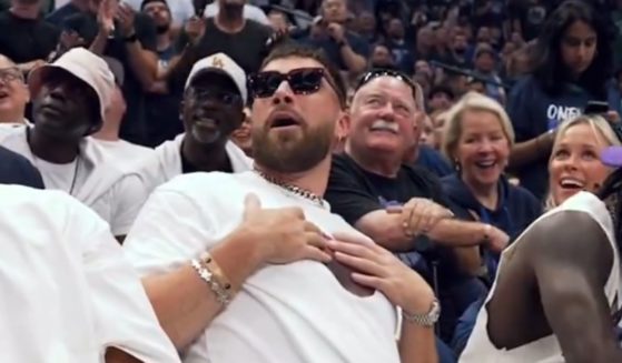 Travis Kelce is shown on the jumbotron at the Dallas Mavericks game on Sunday.