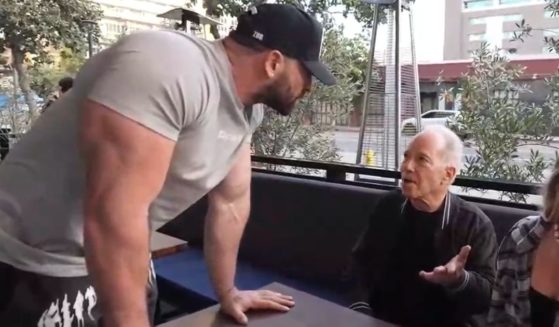 A man is confronted by YouTuber Bradley Martyn at a Los Angeles restaurant.