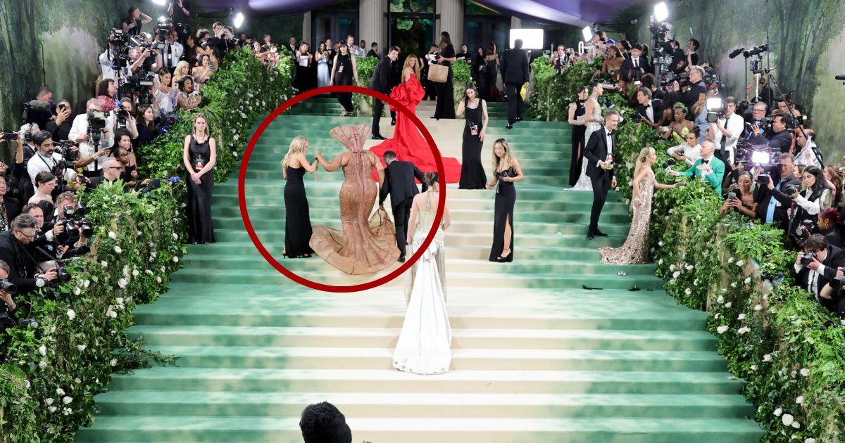 Workers at the Met Gala had to help several celebrities - including Lizzo, circled - up the stairs at The Metropolitan Museum of Art in New York City on Monday because their outfits did not allow them to walk upstairs on their own.
