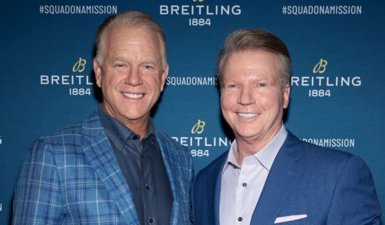 Boomer Esiason and Phil Simms, seen in a file photo from November 2021, will no longer co-host "NFL Today" on CBS, it was announced Monday.