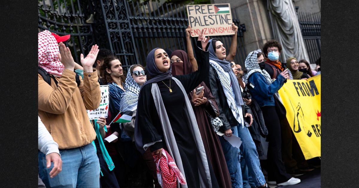 Pro-Palestinian protesters hold a rally outside of Columbia University on Tuesday in New York City.