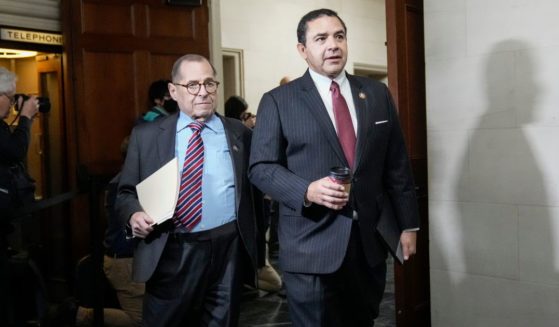 Reps. Jerry Nadler, left, and Henry Cuellar depart a leadership election meeting with the Democratic caucus in the Longworth House Office Building on Capitol Hill in Washington on Nov. 30.