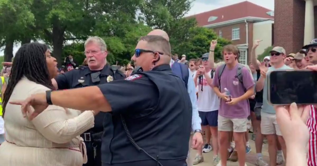 Counter-protesters at Ole Miss jeered at a pro-Palestinian protester who was livestreaming as both sides clashed on Thursday.