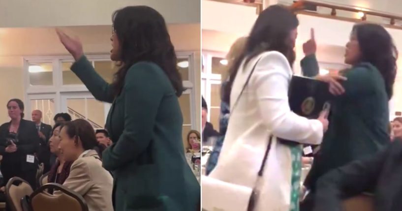 The protester continued shouting at Pelosi until she was escorted out of the facility.