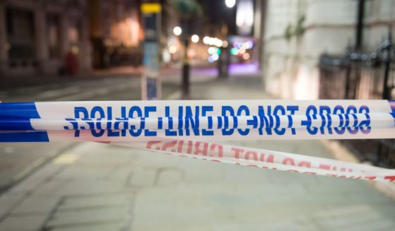 Police tape blocks off a crime scene in London, England, on March 9, 2020.
