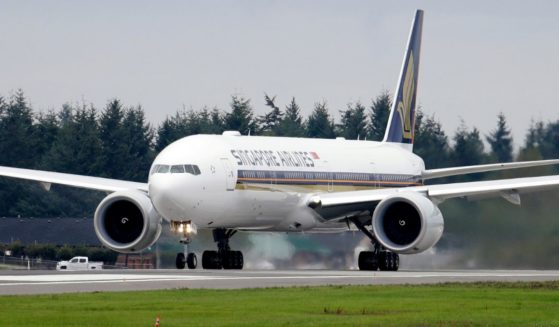 A Singapore Airlines Boeing 777-312ER readies to take off from Paine Field in Everett, Washington, on Sept. 17, 2013.