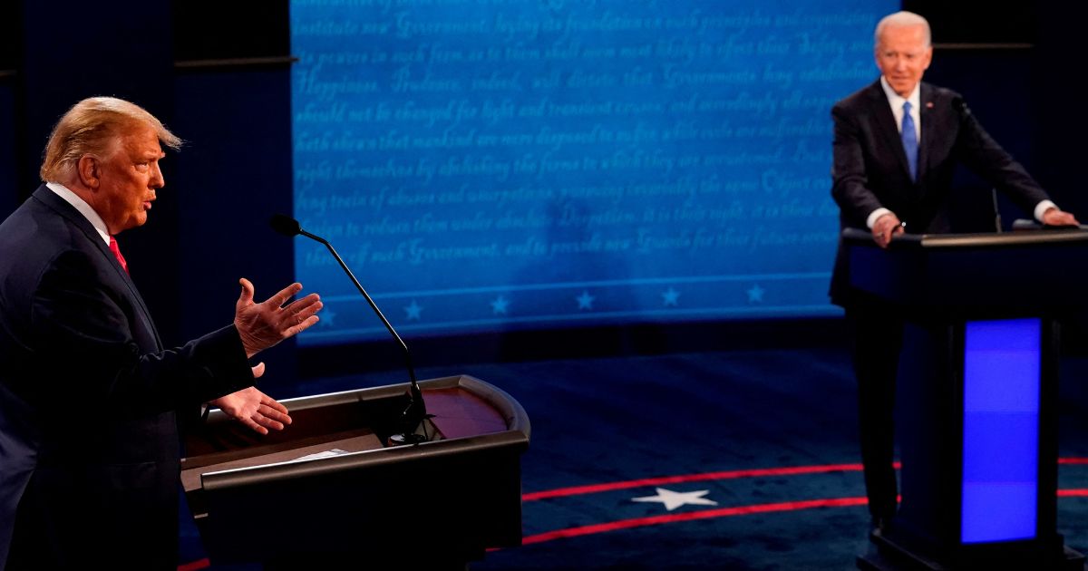 Then-President Donald Trump and Democratic Presidential candidate and former Vice President Joe Biden argue during the final presidential debate at Belmont University in Nashville, Tennessee, on October 22, 2020.