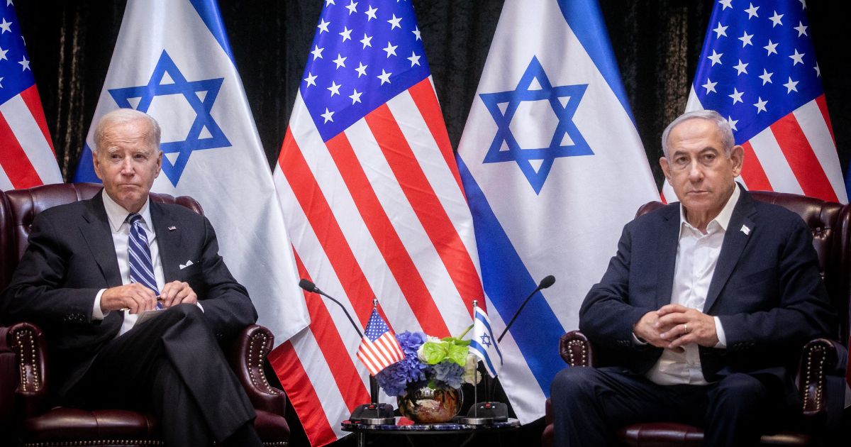 President Joe Biden sits with Israeli Prime Minister Benjamin Netanyahu at the start of the Israeli war cabinet meeting in Tel Aviv on Oct. 18.