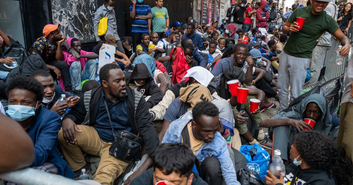A multitude of recently arrived illegal immigrants to New York City camp outside of the Roosevelt Hotel on Aug. 1, 2023.