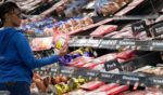 A customer shops at the meat counter at a Walmart in Levittown, New York, on April 24, 2019.
