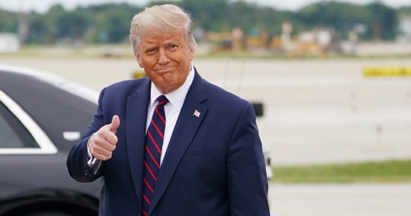 Then-President Donald Trump gives the thumbs-up to the camera in Cleveland, Ohio, in September 2020 just before his first debate with now-President Joe Biden.