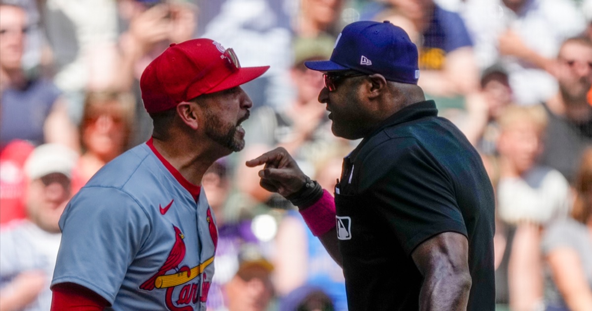 St. Louis Cardinals manager Oliver Marmol argues with home plate umpire Alan Porter during the third inning of the Cardinals game against the Milwaukee Brewers on Sunday.