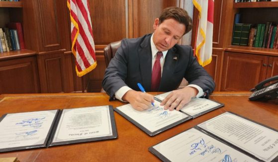 This X screen shot shows Republican Florida Gov. Ron DeSantis signing various bills into law on May 15, 2024.