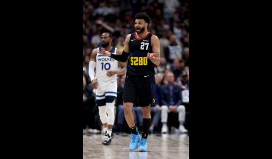 Jamal Murray of the Denver Nuggets reacts after a foul during the second quarter in Game Two of the Western Conference Second Round Playoffs against the Minnesota Timberwolves at Ball Arena on May 6, 2024 in Denver, Colorado.
