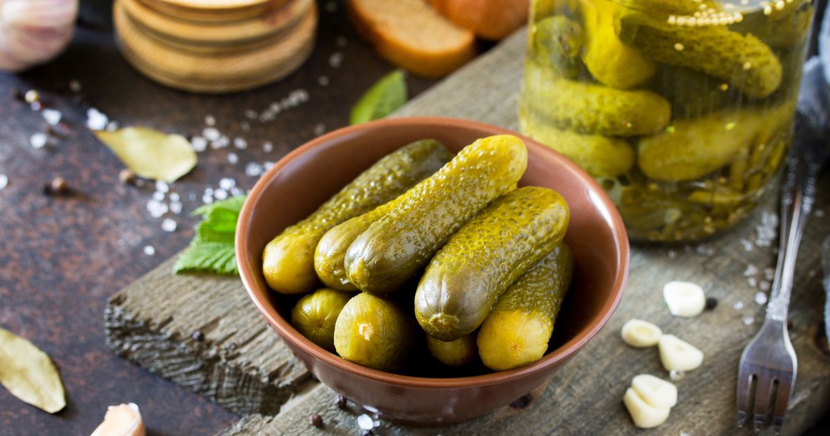 a stock image of a bowl of pickles