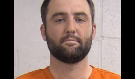This X screen shot shows the mug shot of pro golfer Scottie Scheffler, who was detained on the morning of May 17, 2024 in Louisville, Kentucky.