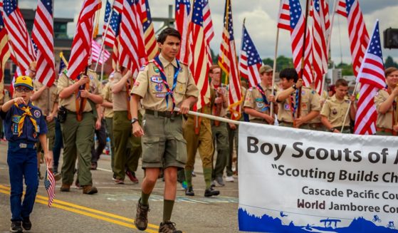 Scouts from Boy Scouts of America take part in the Grand Floral Parade, during Portland, Oregon, Rose Festival in 2019.